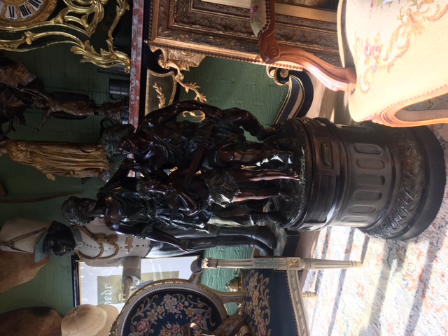 Bronze beautiful bronze statue on a revolving pedestal! Signed Ramcoulet Total height 107 cm and diameter pedestal 43 cm