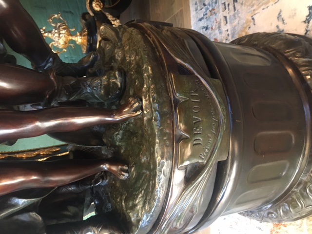 Bronze beautiful bronze statue on a revolving pedestal! Signed Ramcoulet Total height 107 cm and diameter pedestal 43 cm